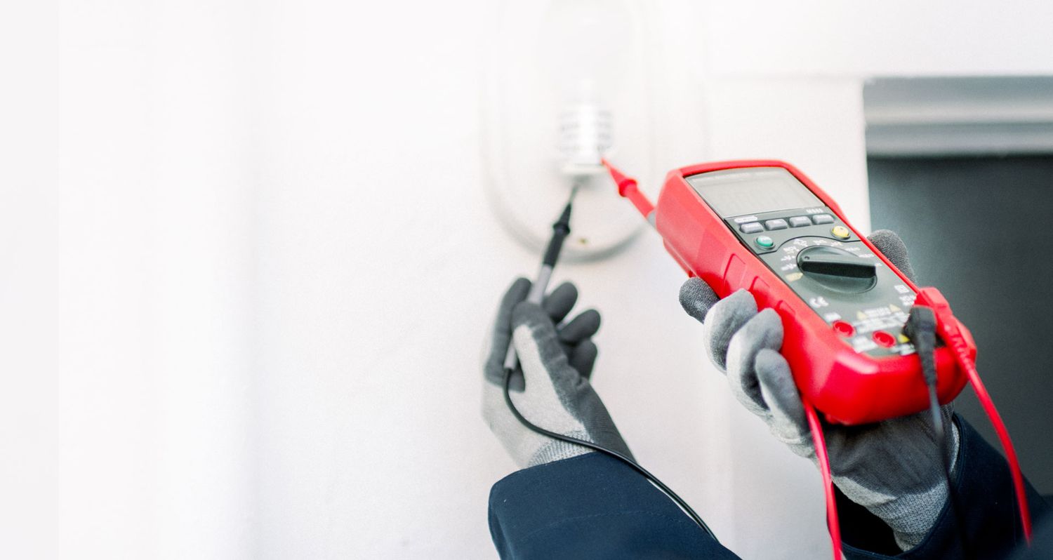 Testing a control panel with a digital multimeter